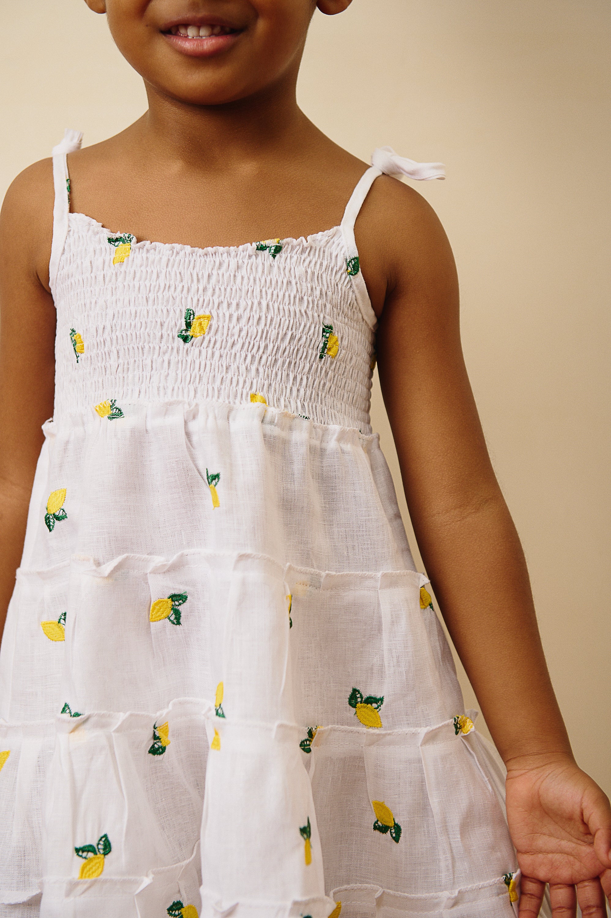 The Amalfi Smocked Linen Dress in Lemon Embroidery